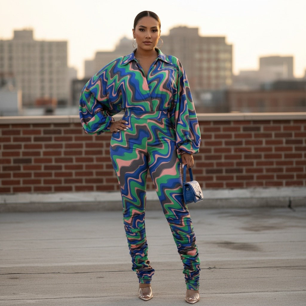 Conjunto de body con mangas acampanadas y estampado abstracto con bajo fruncido