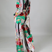 Mono de pierna ancha con cinturón y estampado floral