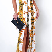 Robe maxi bustier à imprimés multicolores ornée d'une chaîne dorée